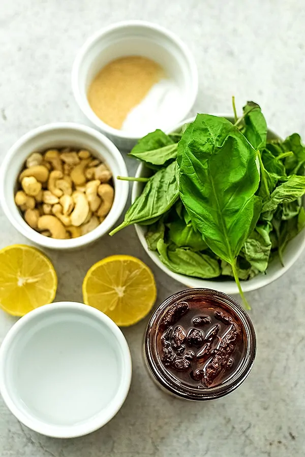 Ingredients to make sun dried tomato pesto.