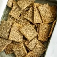 Basket filled with flax almond crackers.