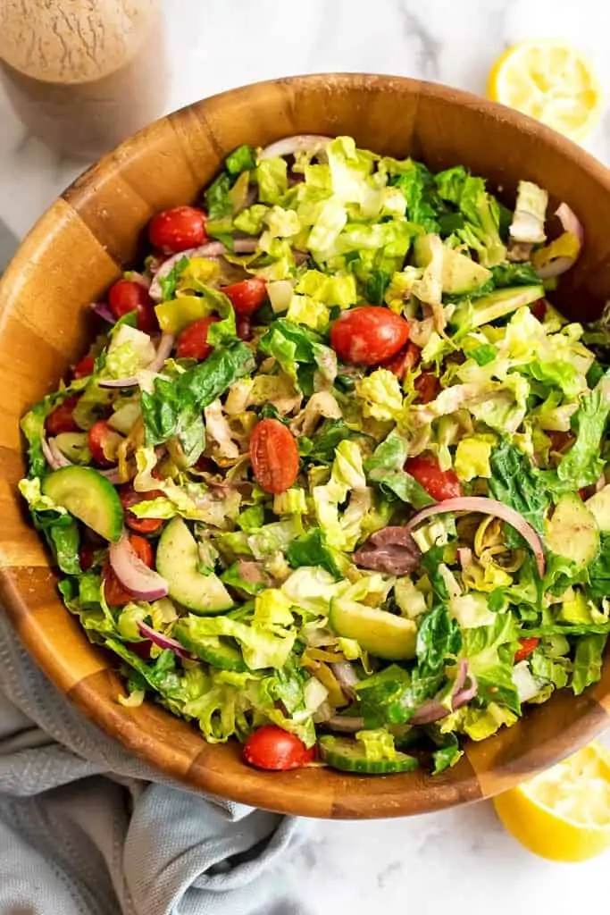 Greek salad in a wooden bowl.