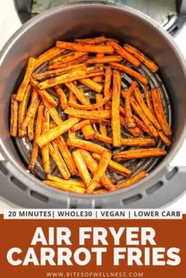 Air fryer basket full of cooked carrot fries.