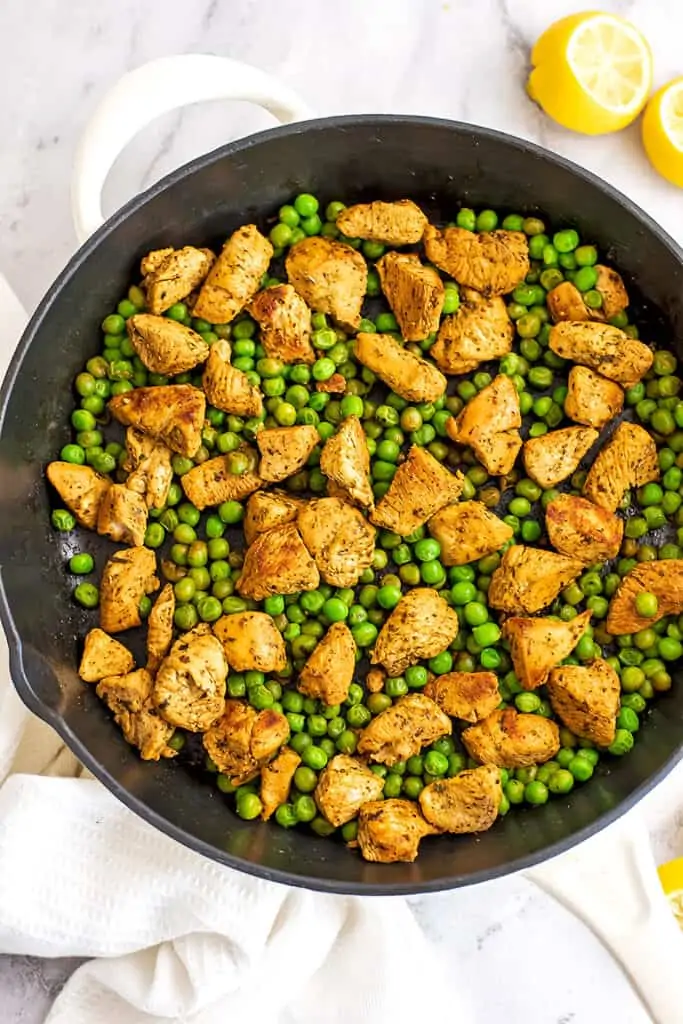 Chicken pea skillet in a cast iron skillet.