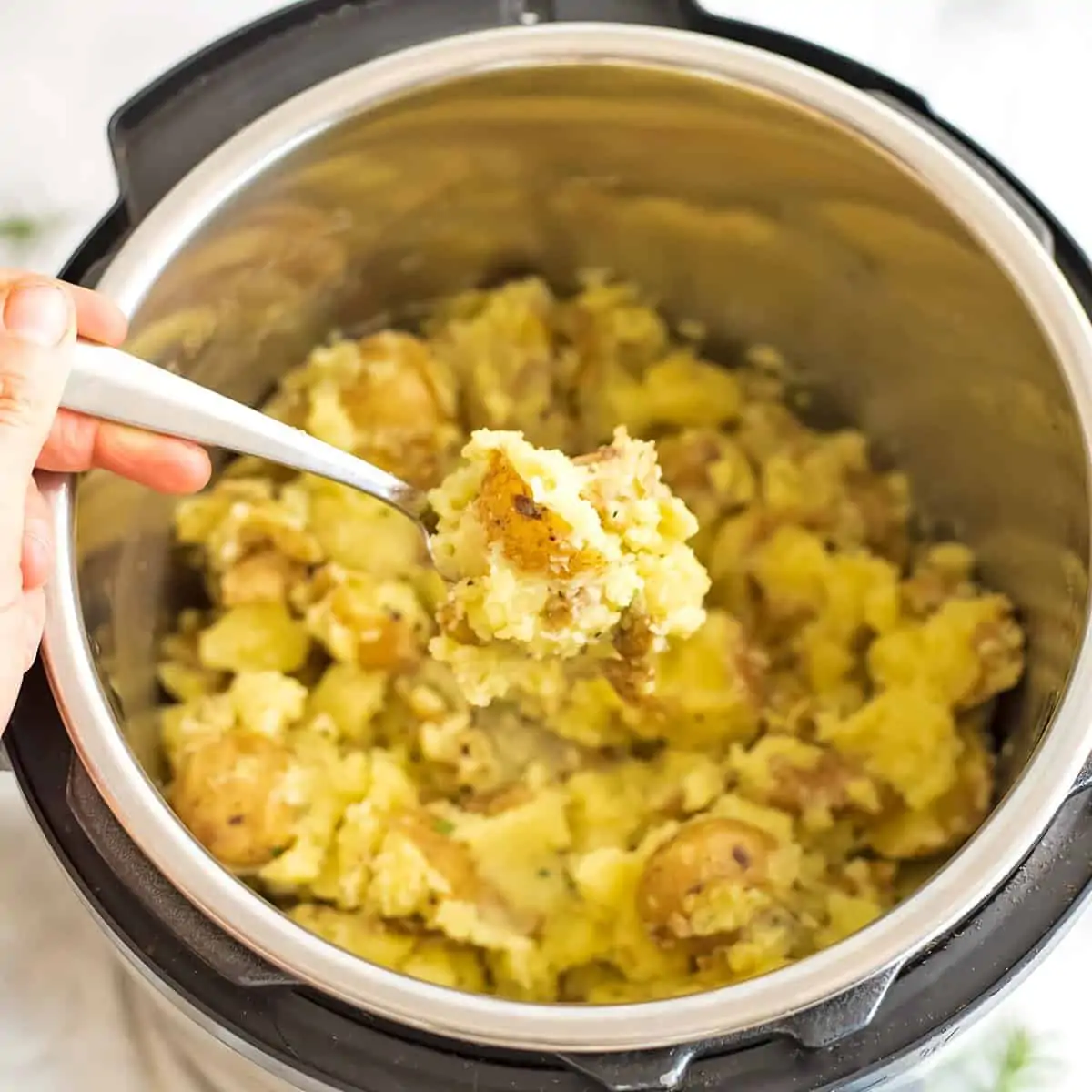 Spoonful of rosemary garlic potatoes.