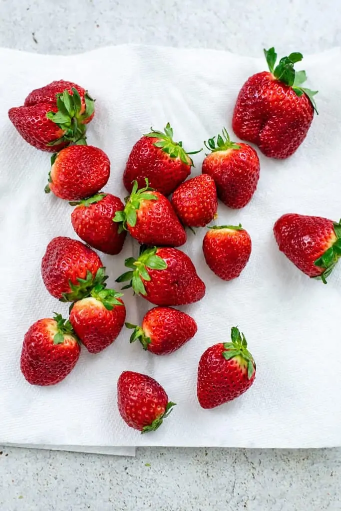Strawberries on a paper towel to dry.