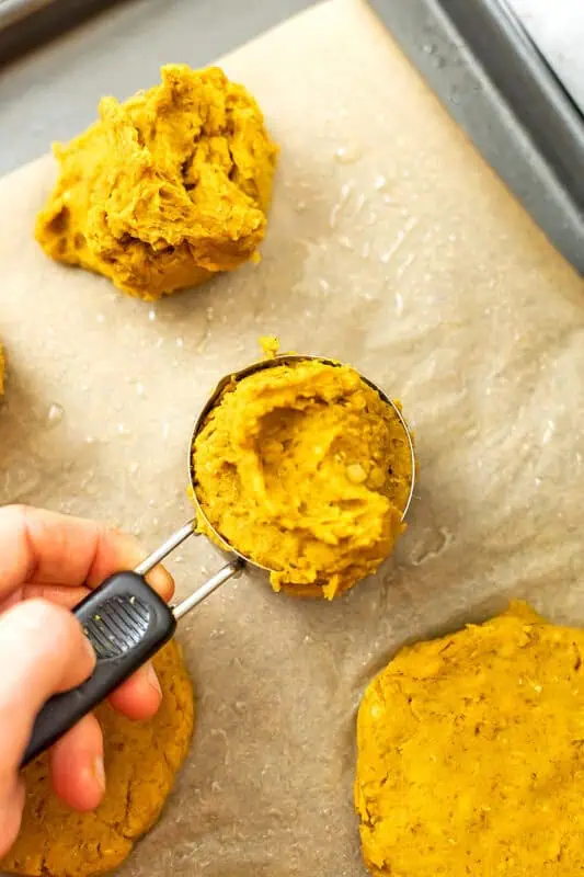 Sweet potato lentil mixture in 1/4 cup measuring cup.