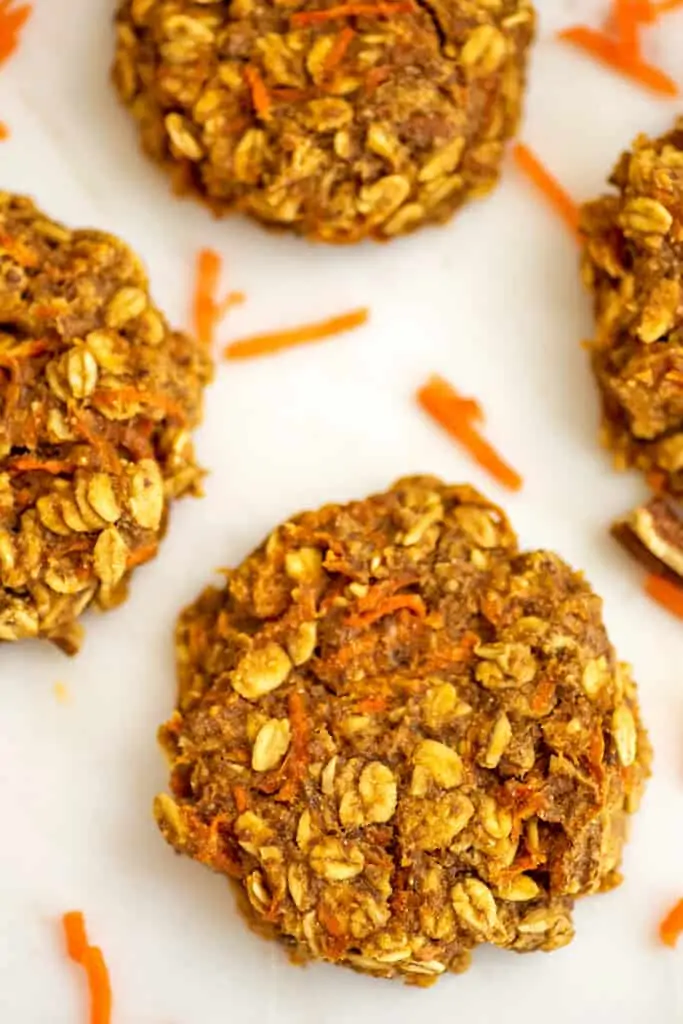 Carrot cake cookies without frosting on a white tray.