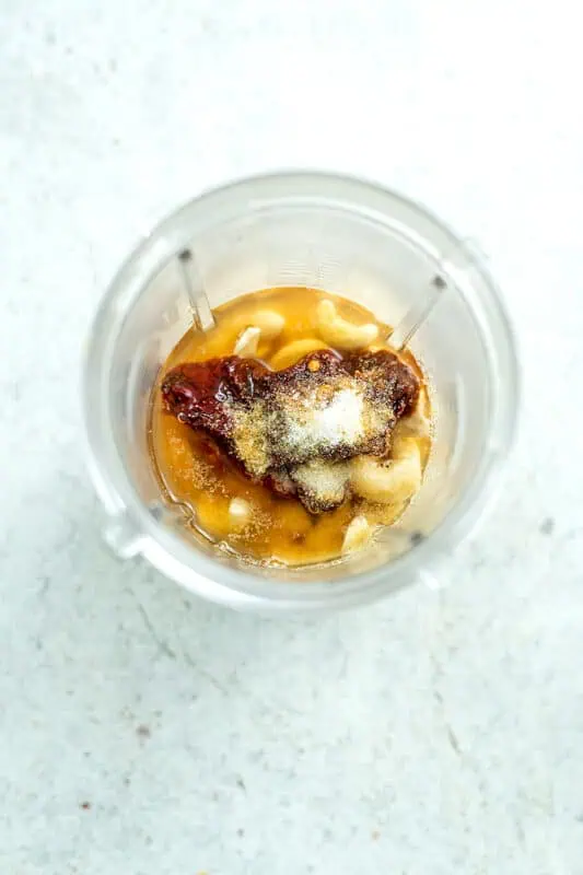 Chipotle mayo ingredients in a blender before blending.
