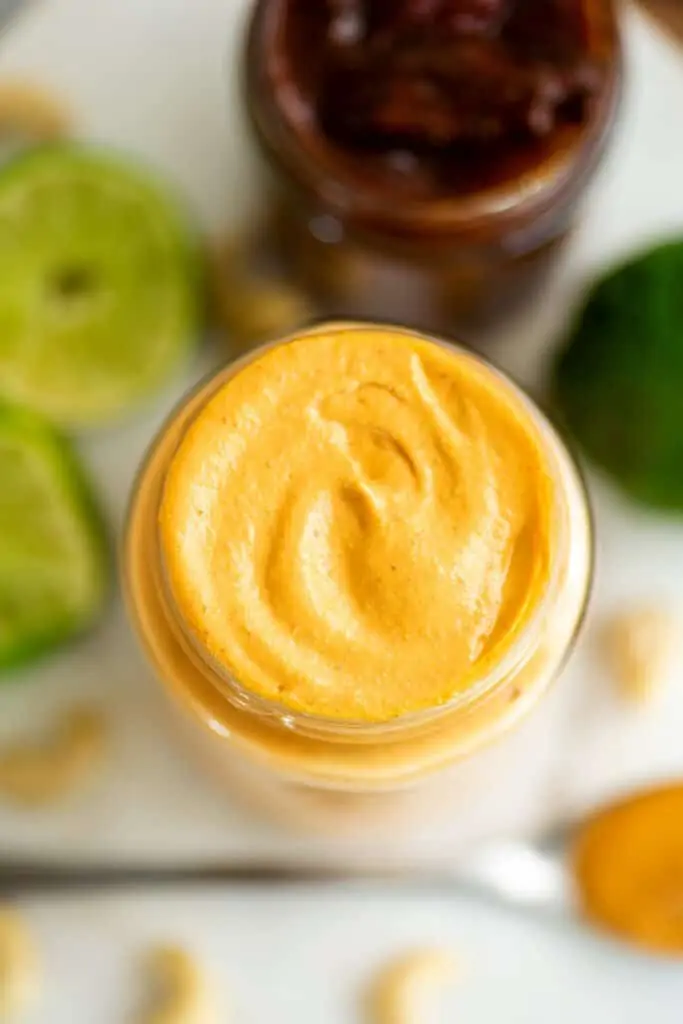 Jar filled with creamy cashew mayo.