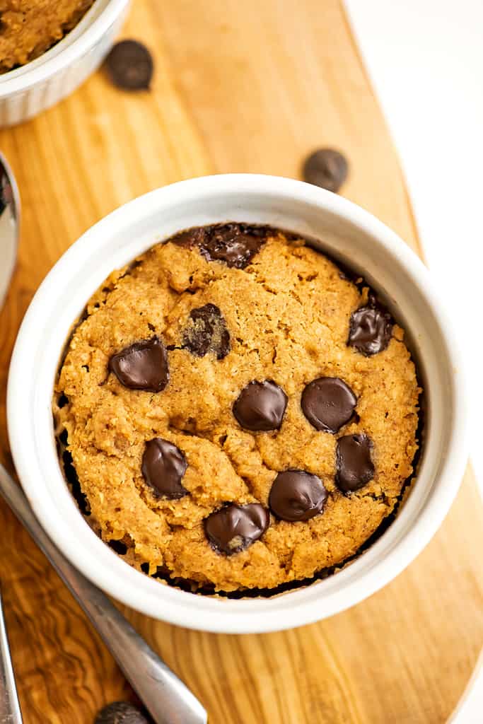 Vegan protein mug cake with chocolate chips on top.