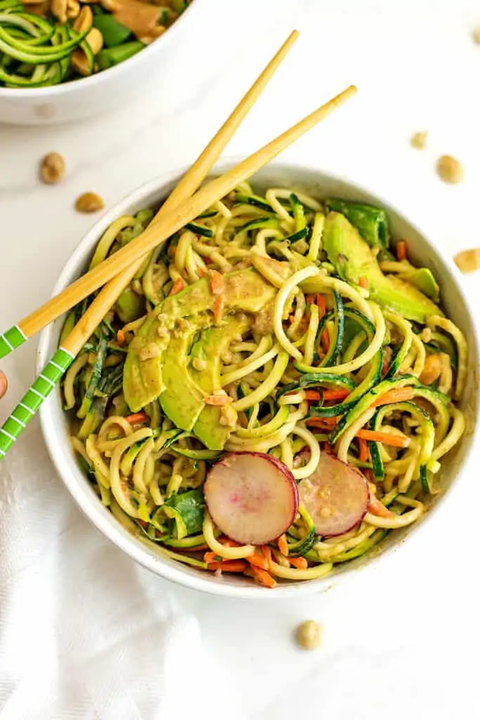 Asian zoodle bowl after stirring in the peanut dressing.