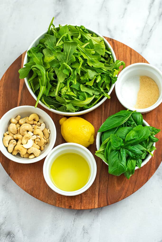 Ingredients to make arugula pesto.