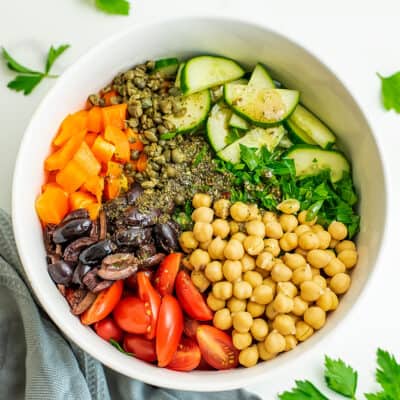 Chopped Mediterranean salad in a large bowl before stirring.