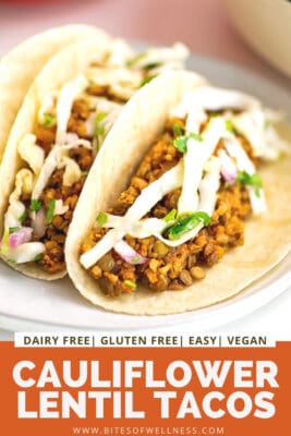 Cauliflower lentil tacos on a plate with slaw on top.