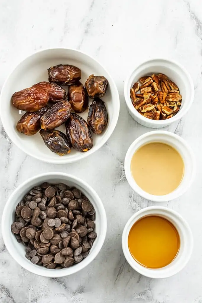 Ingredients to make chocolate covered stuffed dates.