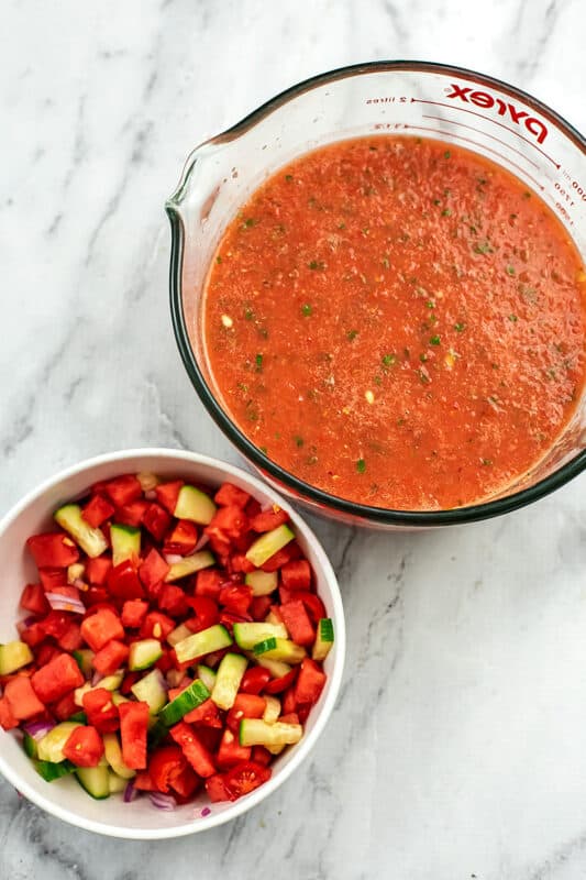 Watermelon gazpacho and toppings before storing.