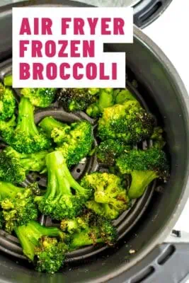 Air fryer basket with cooked broccoli from frozen.