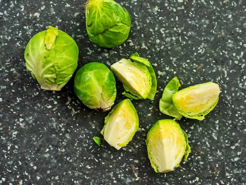 Brussel sprouts cut into quarters.