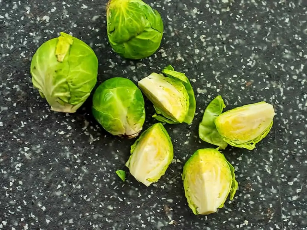 Brussel sprouts cut into quarters.