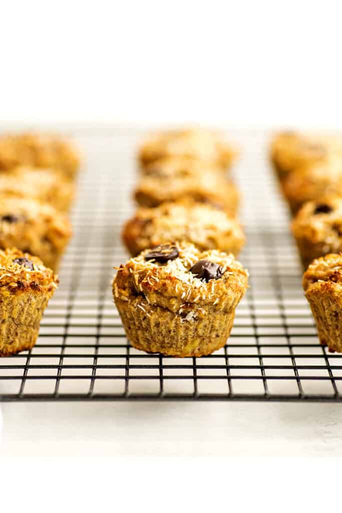 Quinoa banana muffins cooling on a wire cooling rack.