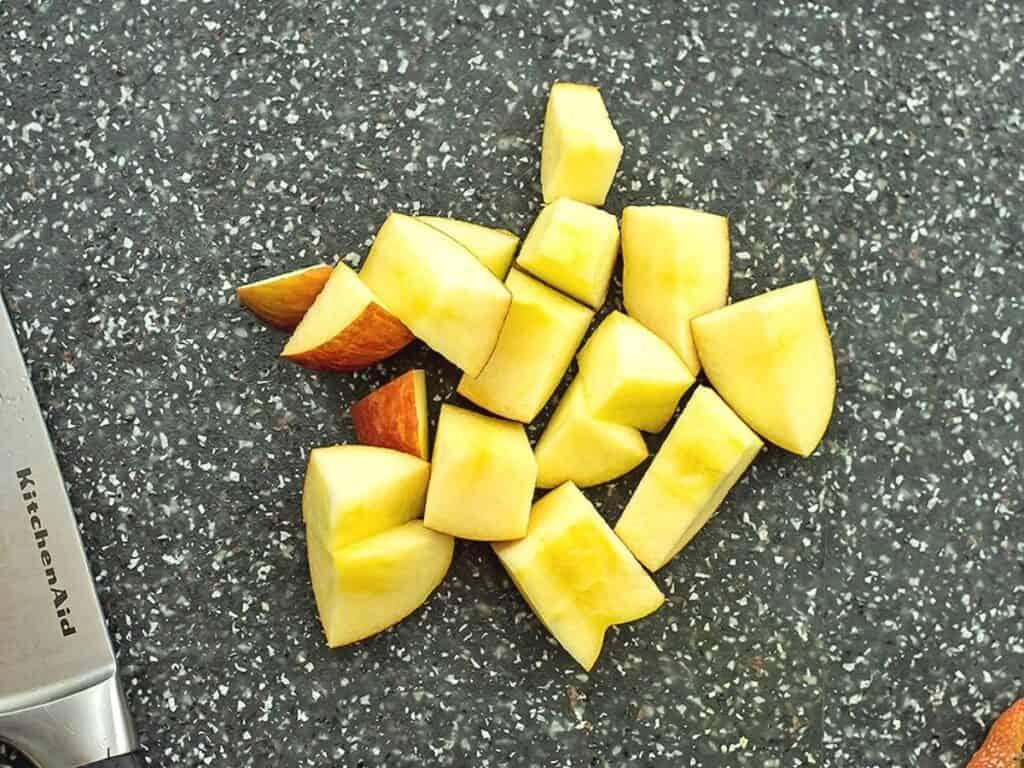 Apple cut into cubes for smoothie.