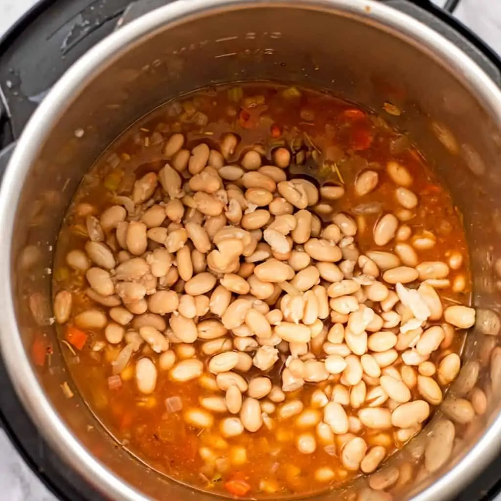 White beans added to soup in instant pot.
