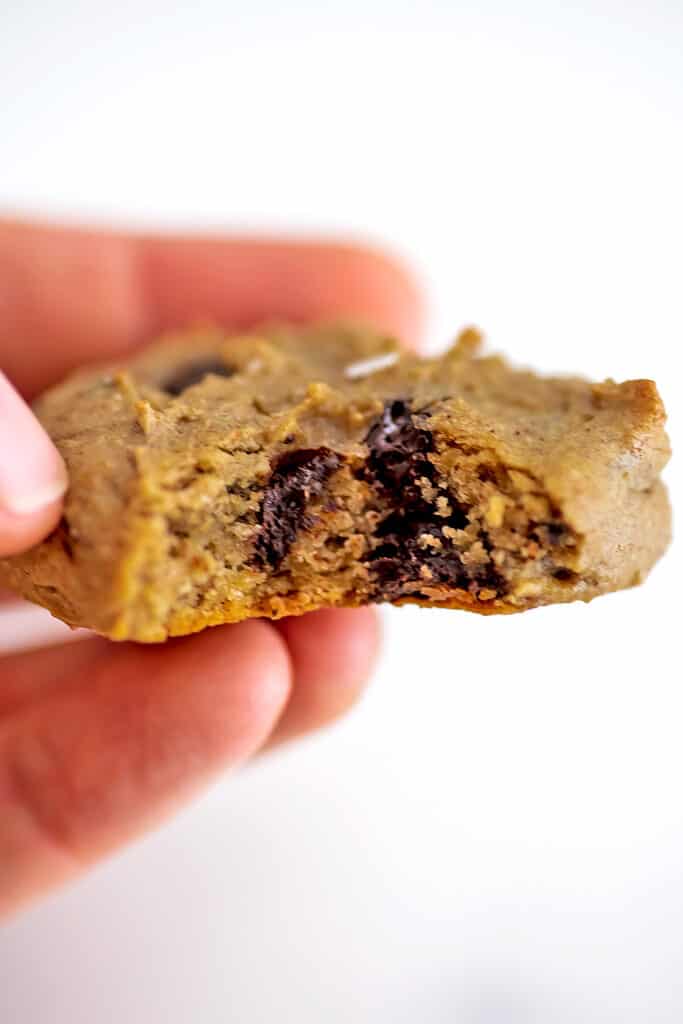 Bite taken from a chickpea peanut butter cookie.