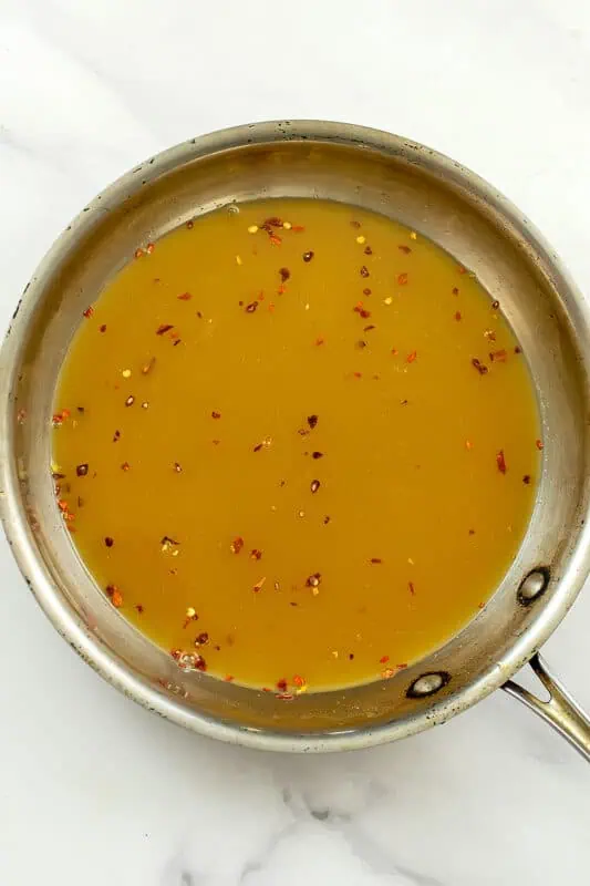 Orange sauce before thickening with arrowroot.