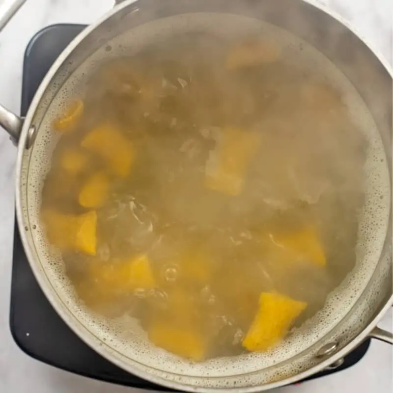 Gnocchi floating to top of boiling water.