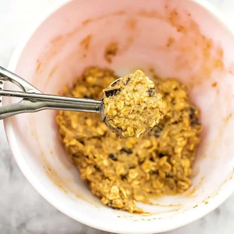 Cookie scoop of vegan chocolate chip oatmeal cookie batter.