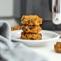 Air fryer oatmeal cookies on a white plate.