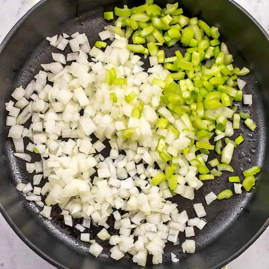 Celery and onion in a skillet.
