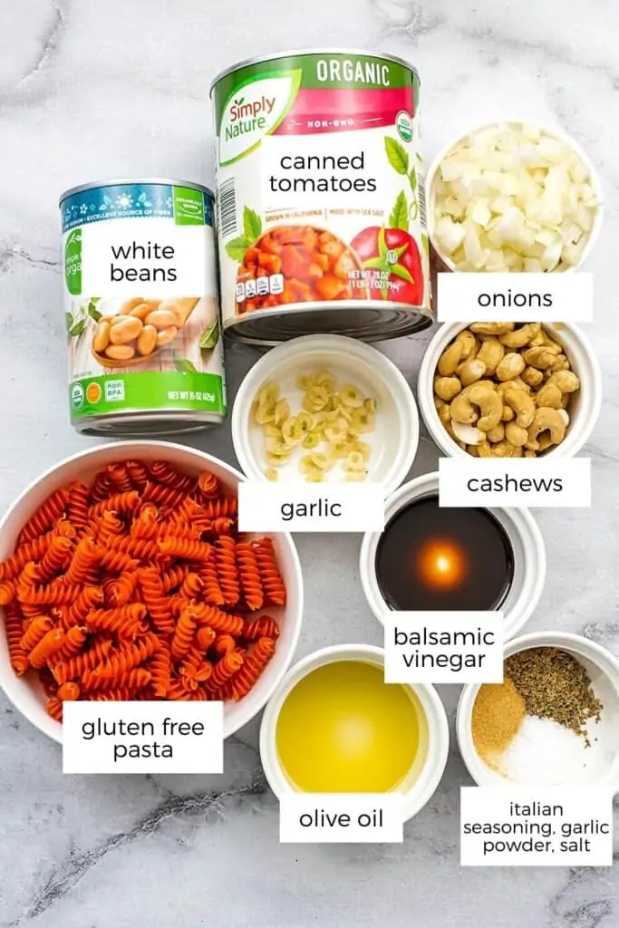 Ingredients to make vegan creamy tomato pasta.