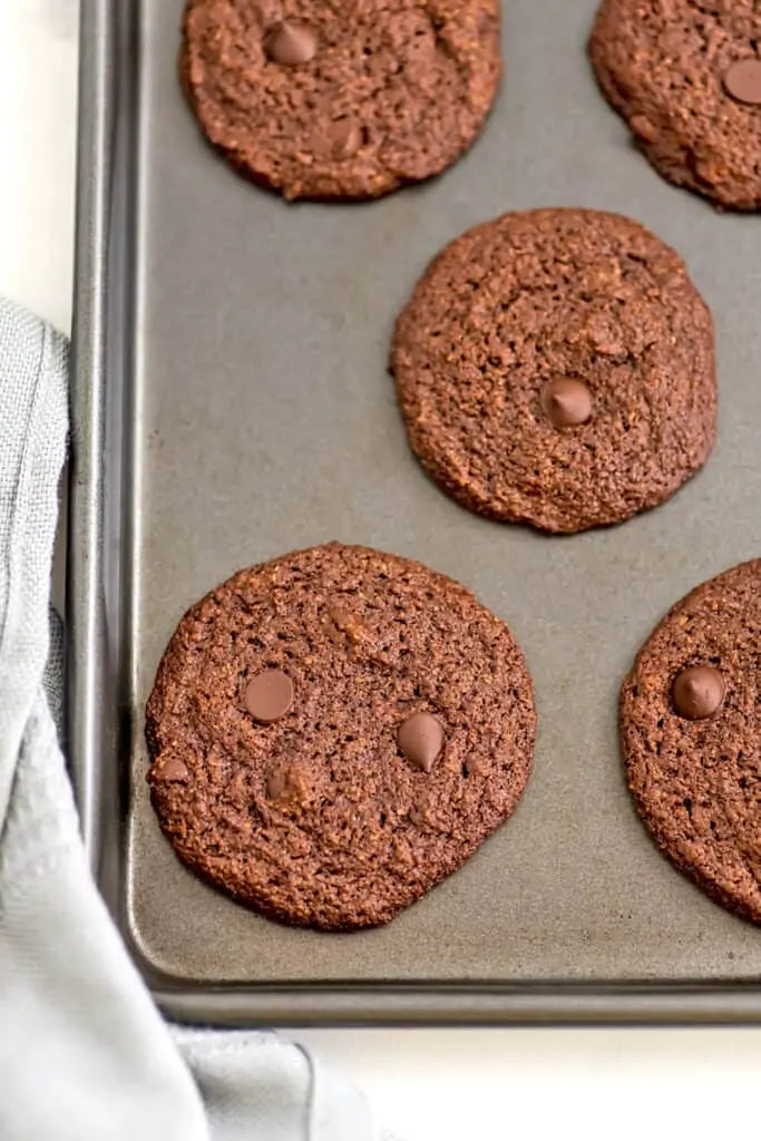 Double chocolate chip cookies on sheet pan.