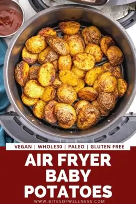 Small potatoes in air fryer basket.