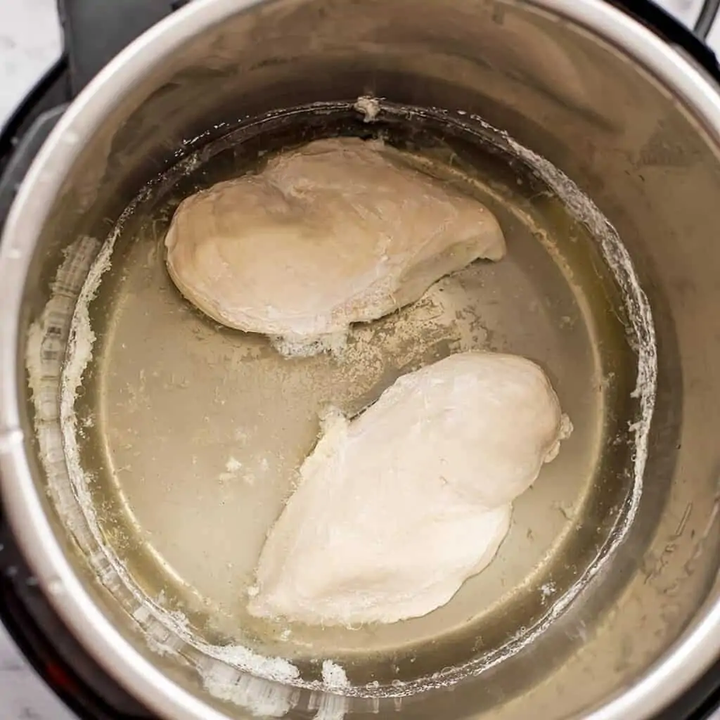 Cooked chicken breast in the instant pot with water.