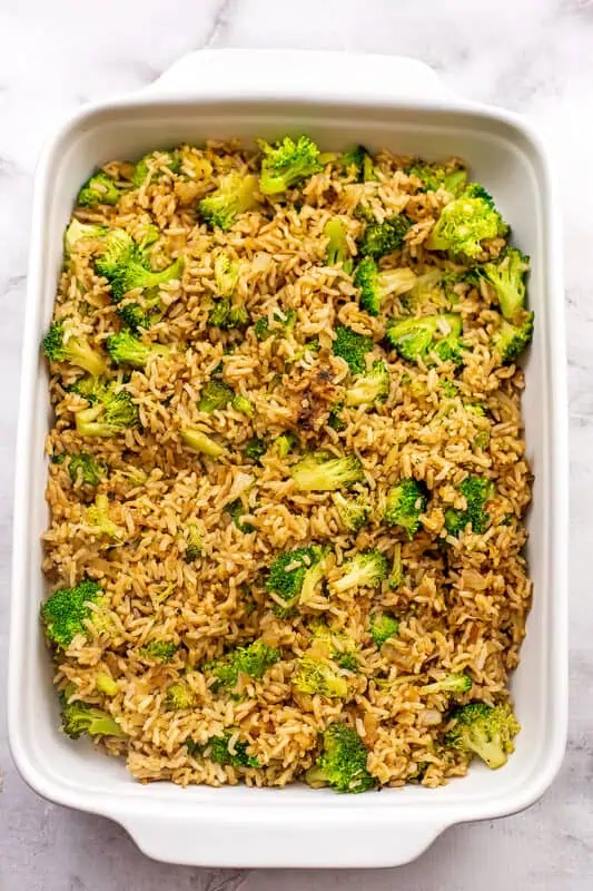 Broccoli and rice added to casserole dish.