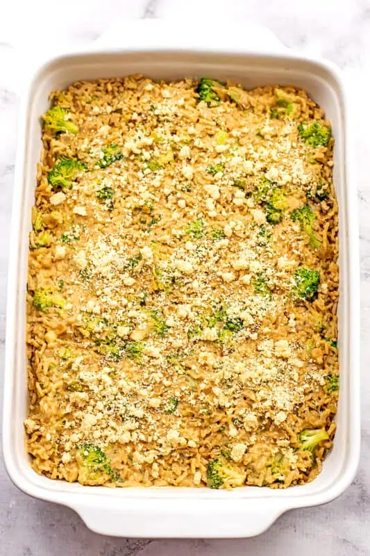 Breadcrumbs added to broccoli casserole before baking.