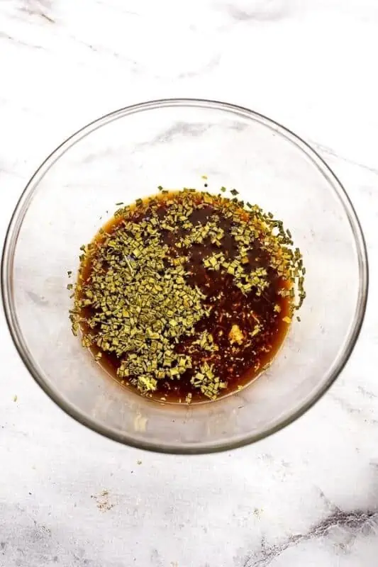Ingredients for homemade teriyaki sauce in glass bowl.