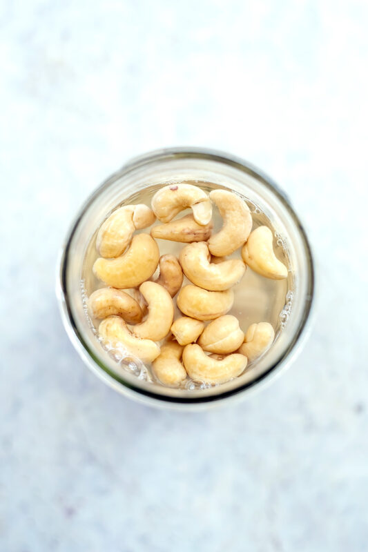 Cashews soaking in boiling water. 