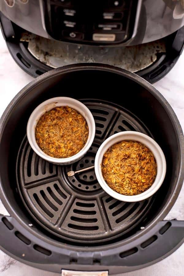 Baked oatmeal in air fryer basket after baking.
