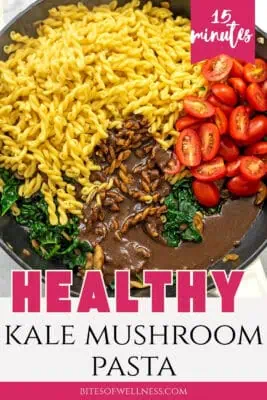 Ingredients to make kale mushroom pasta in a skillet before stirring them together.