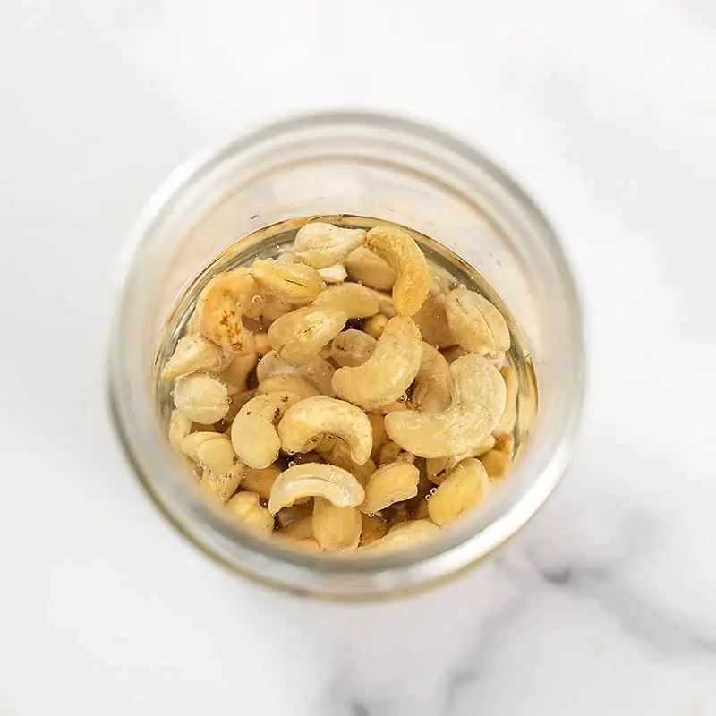Cashews when added to a glass of hot water