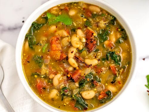 https://bitesofwellness.com/wp-content/uploads/2022/05/spicy-white-bean-stew-social-500x375.jpg