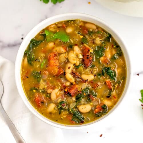 https://bitesofwellness.com/wp-content/uploads/2022/05/spicy-white-bean-stew-social-500x500.jpg