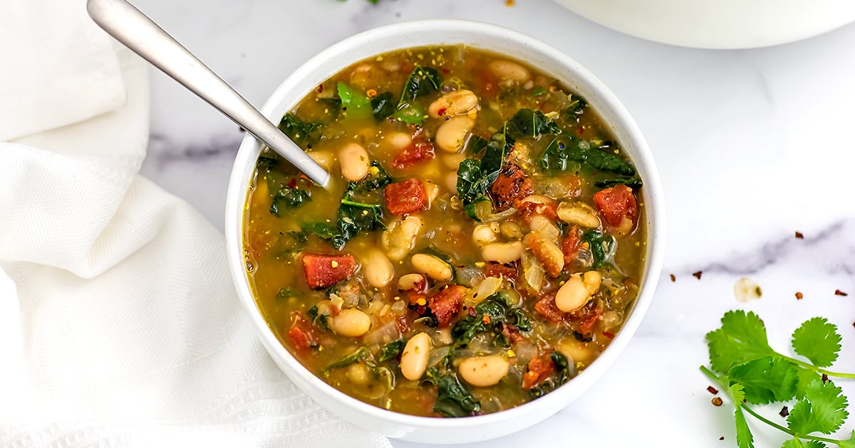 https://bitesofwellness.com/wp-content/uploads/2022/05/spicy-white-bean-stew-social1.jpg