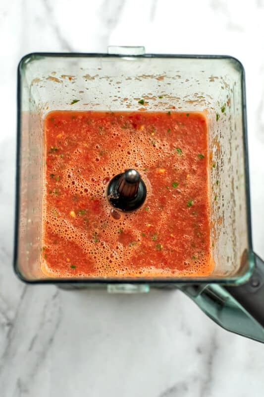 Watermelon gazpacho soup in blender after blending.