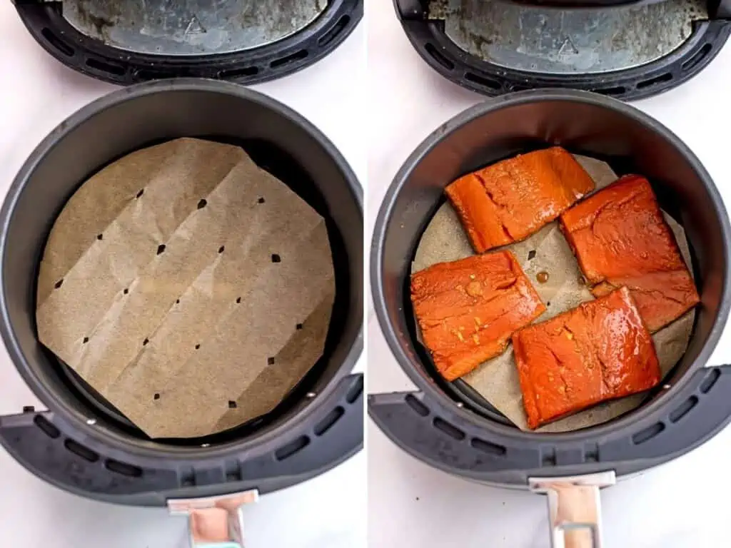 Adding parchment paper and salmon filets to air fryer basket.