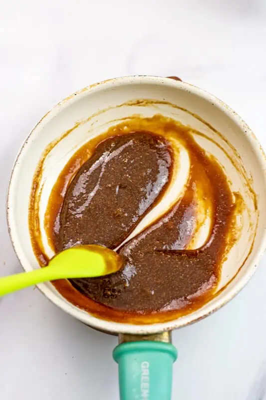 Teriyaki sauce in a skillet after heating through to thicken.