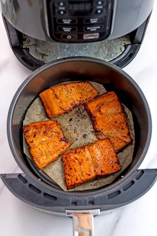 Air fryer teriyaki salmon after cooking, before adding the glaze.