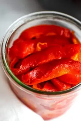 Thin slices of air fryer roasted red peppers.