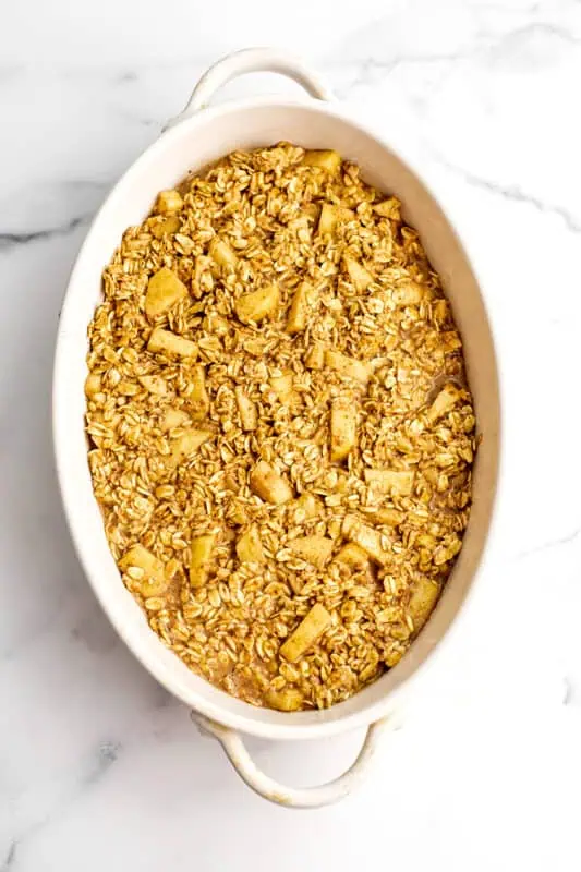 Apple oatmeal in casserole dish before baking.